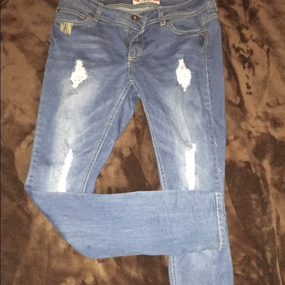 Ripped blue jeans